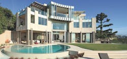 Designed to withstand natural disasters, exterior, poolside of modern mansion in hills above Los Angeles by Landry Design Group Designed to withstand natural disasters, exterior, poolside of modern mansion in hills above Los Angeles by Landry Design Group
