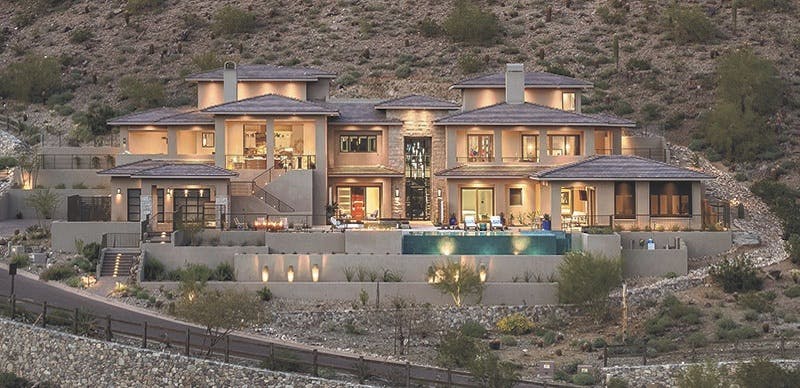Exterior, dusk, of hillside home in Phoenix, Ariz. by Cullum Homes