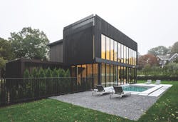 Modern style custom home using black stained cedar Modern style custom home using black stained cedar