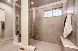 Curbless shower, no door, bench seats at each end Curbless shower, no door, bench seats at each end