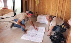 Construction crew members working on site Construction crew members working on site