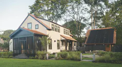 Cottage with solar array on garage in high-performance, net zero house at Jamestown, R.I.