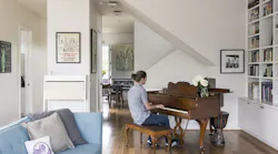 Prefab custom home with sculpture stairway