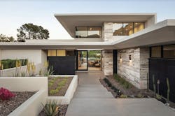 razor-like folding forms gives custom home razor's edge its name razor-like folding forms gives custom home razor's edge its name