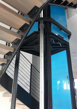 The Acrylic Panels Of The Hoistway Are Protected By Plastic Sheeting During Installation In Tight Confines The Acrylic Panels Of The Hoistway Are Protected By Plastic Sheeting During Installation In Tight Confines