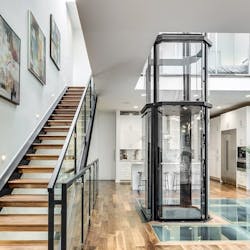 The Savaria Vuelift Complements The Use Of Glass Throughout The Home The Savaria Vuelift Complements The Use Of Glass Throughout The Home