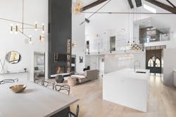 Open floor plan with white walls and fireplace Open floor plan with white walls and fireplace