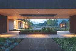 Patio receding into high-performance house Patio receding into high-performance house