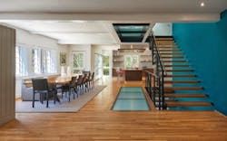 Stairs with living room and long dining table Stairs with living room and long dining table