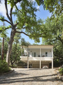 The steepest part of the hill falls away from the ADU, so building a retaining wall at the end of the drive prevents extreme water runoff while repurposing stones cleared from the construction site. The steepest part of the hill falls away from the ADU, so building a retaining wall at the end of the drive prevents extreme water runoff while repurposing stones cleared from the construction site.