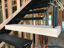 Closeup of floating steel stairway supports Closeup of floating steel stairway supports