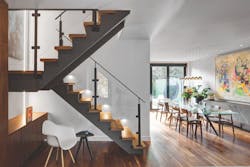 Scissor stairs leading to long dining table Scissor stairs leading to long dining table