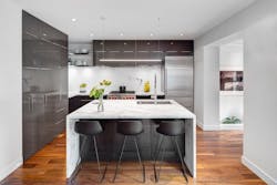 Black and white kitchen with waterfall island Black and white kitchen with waterfall island