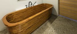 Adaptive reuse with mahogany bath tub Adaptive reuse with mahogany bath tub