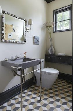 Powder room with geometric pattern on floor tile Powder room with geometric pattern on floor tile