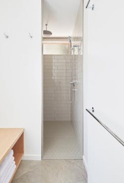 bathroom with wood bench and clerestory windows bathroom with wood bench and clerestory windows