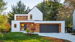 White stucco house and garage door with birch trim White stucco house and garage door with birch trim