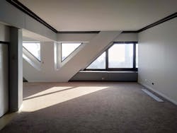 V-shaped steel bracing is covered by drywall in carpeted condo V-shaped steel bracing is covered by drywall in carpeted condo
