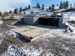 construction site in the snow with below-grade insulation construction site in the snow with below-grade insulation