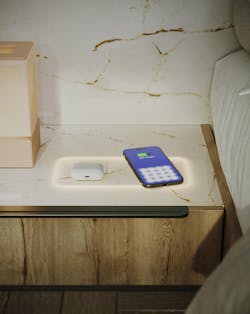 phone charging on a bedroom nightstand phone charging on a bedroom nightstand