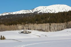 A Wyoming home in a snowy meadow A Wyoming home in a snowy meadow