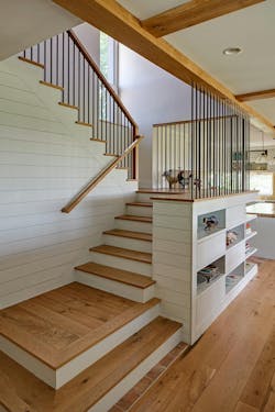 Interior staircase in the home with wood details Interior staircase in the home with wood details