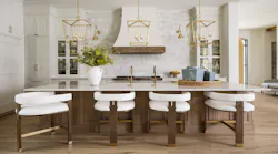 A recently renovated white kitchen with wooden accents