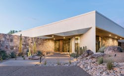 Modernist custom home with low-water landscaping, demonstrating the trend in water-conscious landscapes Modernist custom home with low-water landscaping, demonstrating the trend in water-conscious landscapes