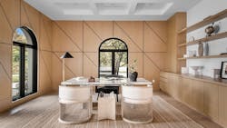 A wood-drenched interior with light wood flooring, walls, and cabinetry, reflecting the 'wood-drenching' trend A wood-drenched interior with light wood flooring, walls, and cabinetry, reflecting the 'wood-drenching' trend