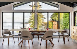 Mid-century modern dining area overlooking the lake on Mercer Island | Dyna Builders Mid-century modern dining area overlooking the lake on Mercer Island | Dyna Builders