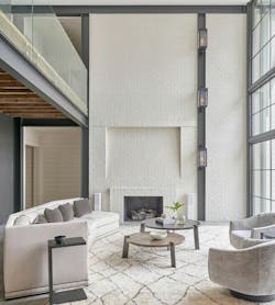Living room with soaring brick fireplace by Element Construction in South Carolina Living room with soaring brick fireplace by Element Construction in South Carolina