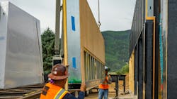 The Dario steel shell panels are built in a controlled environment, then delivered and installed by Escobedo. The Dario steel shell panels are built in a controlled environment, then delivered and installed by Escobedo.