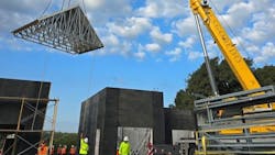 The biggest misconception is that the Dario steel shell system is only for simple, modern homes. Here, a panel is delivered for an elaborate French Chateau currently under construction. The biggest misconception is that the Dario steel shell system is only for simple, modern homes. Here, a panel is delivered for an elaborate French Chateau currently under construction.