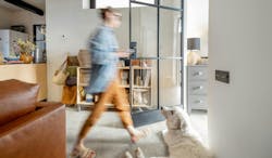 Construction concierge walking through a modern interior (blurred image) Construction concierge walking through a modern interior (blurred image)