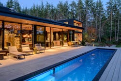 Backyard of Deer Harbor home, featuring a swimming pool and seating area Backyard of Deer Harbor home, featuring a swimming pool and seating area