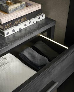 Interior of designer Jerel Lake's custom closet, showing the lighted drawer system Interior of designer Jerel Lake's custom closet, showing the lighted drawer system