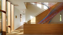 After adding a unique rainbow netting, this staircase became the centerpiece of this 8,500-square-foot custom home. After adding a unique rainbow netting, this staircase became the centerpiece of this 8,500-square-foot custom home.