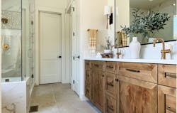 Wellness-driven bathroom designed with warm neutral color palette and natural materials Wellness-driven bathroom designed with warm neutral color palette and natural materials