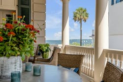 Coastal porch on a Charleston home with views to the ocean Coastal porch on a Charleston home with views to the ocean