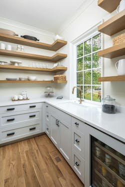 Hidden storage solutions and pantries are increasing in popularity, while open shelving is falling out of favor. Hidden storage solutions and pantries are increasing in popularity, while open shelving is falling out of favor.