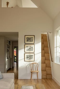 An alternating-tread staircase was selected as a way to save on both costs and space. An alternating-tread staircase was selected as a way to save on both costs and space.