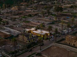 Photo of a Cover home surrounded by empty fire ravaged lots in Pacific Palisades Photo of a Cover home surrounded by empty fire ravaged lots in Pacific Palisades