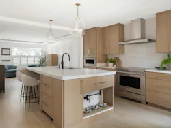The home is finished with a light, neutral color palette that helps open up the space and make it feel larger than it actually is.