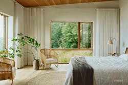 A window configuration featuring an open casement connects a warm and airy bedroom to the nearby woods and fields. A window configuration featuring an open casement connects a warm and airy bedroom to the nearby woods and fields.