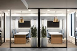 Office setting with two Imber pendants by Cerno Group Office setting with two Imber pendants by Cerno Group
