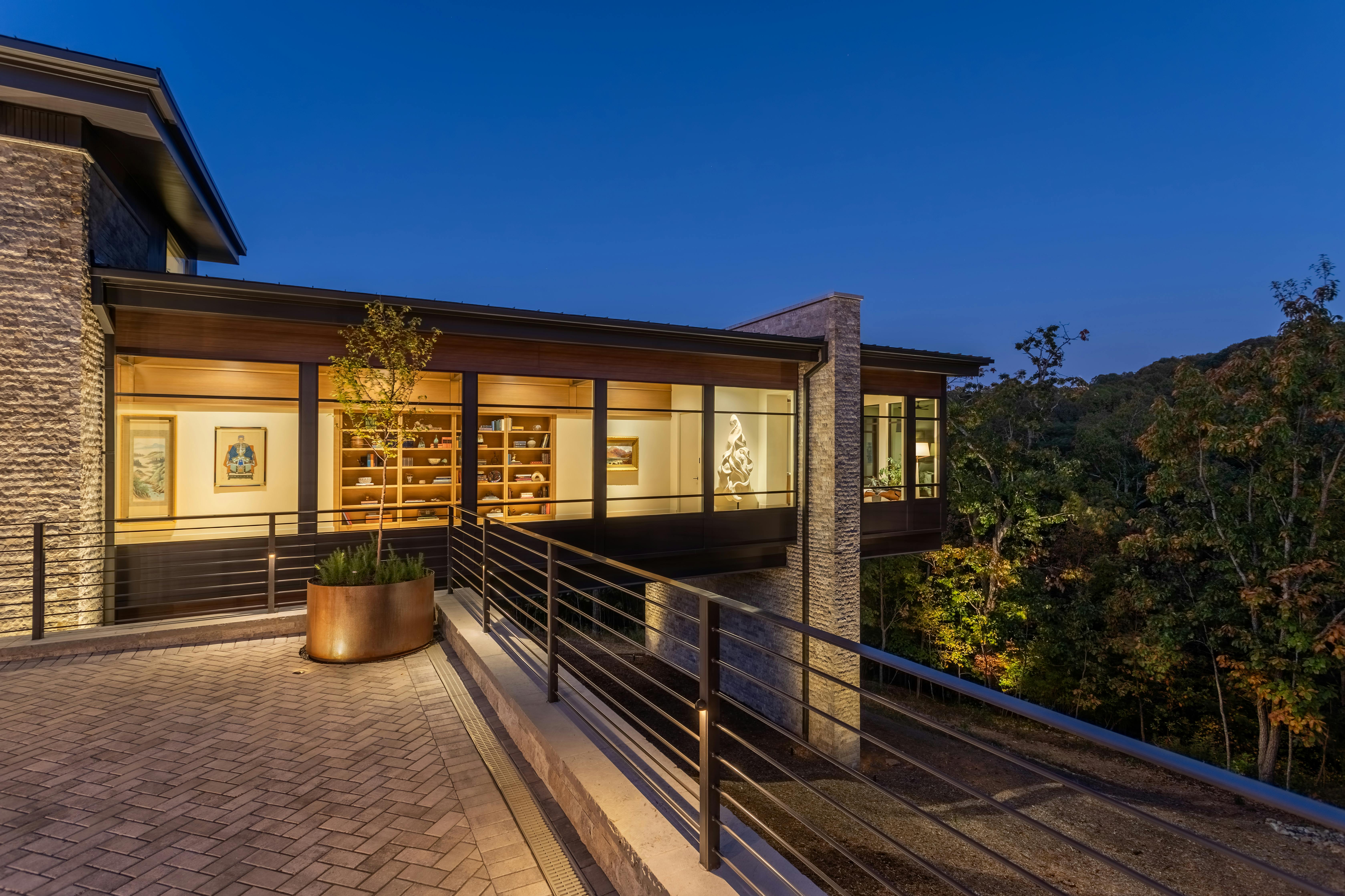 Cantilevered bedroom suite at night
