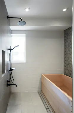 Bathroom with a wooden Japanese soaking tub Bathroom with a wooden Japanese soaking tub