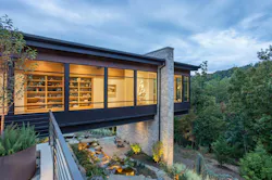 Exterior view of a cantilevered bedroom Exterior view of a cantilevered bedroom