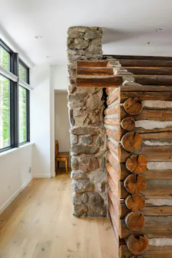 Key elements of the original log home were preserved inside the new build. Key elements of the original log home were preserved inside the new build.