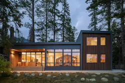 Esterior of a mountain modern home, where a 1915 log cabin is embedded inside Esterior of a mountain modern home, where a 1915 log cabin is embedded inside